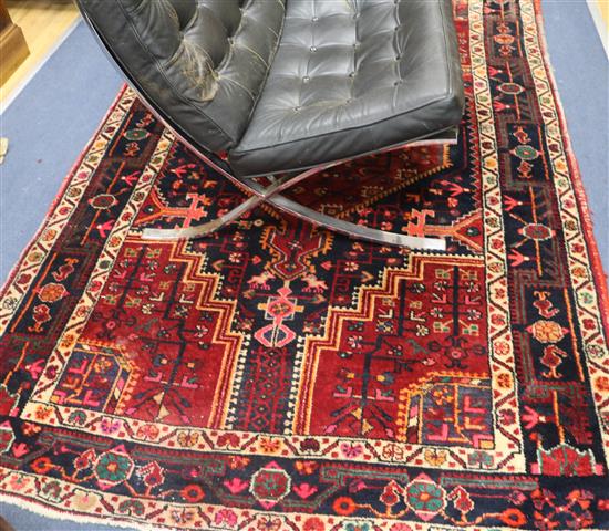 A Caucasian red ground rug, 7ft 4in. x 4ft 10in.